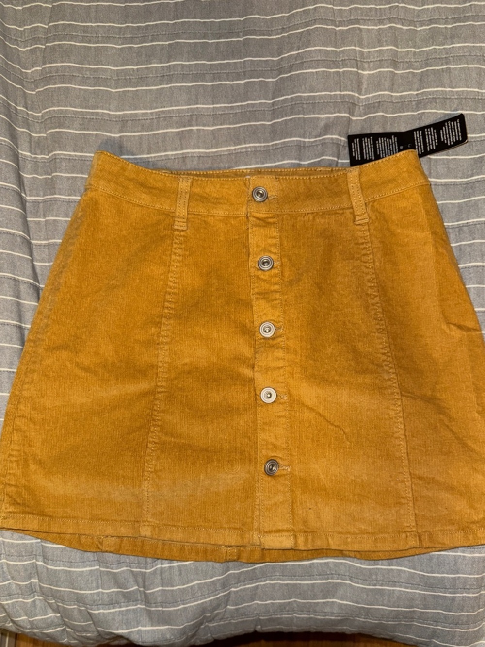 Button-Front Corduroy Mini Skirt in Mustard Yellow
